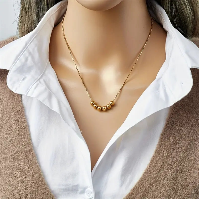 Elegant Golden Bead Pendant Necklace
